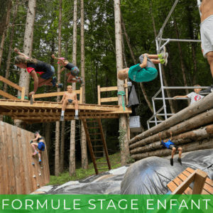 Children jumping on a forest adventure course.