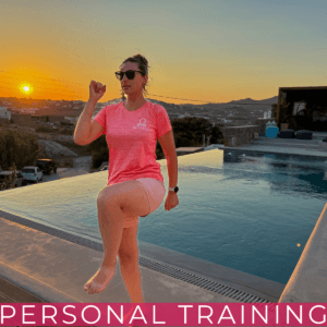 Woman training by a pool at sunset.